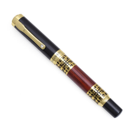 Luxury red and black fountain pen with engraved golden accents and polished cap.